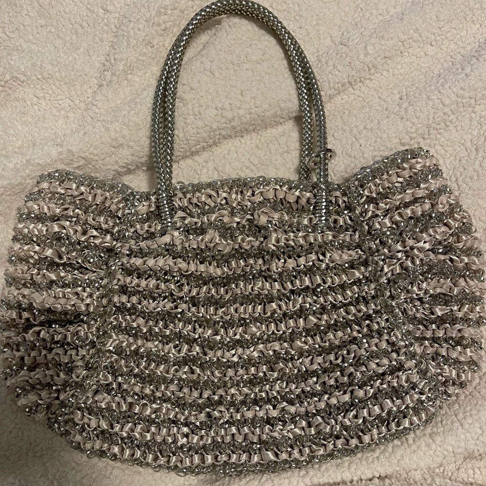 Antiprima silver wire and fabric woven bag.